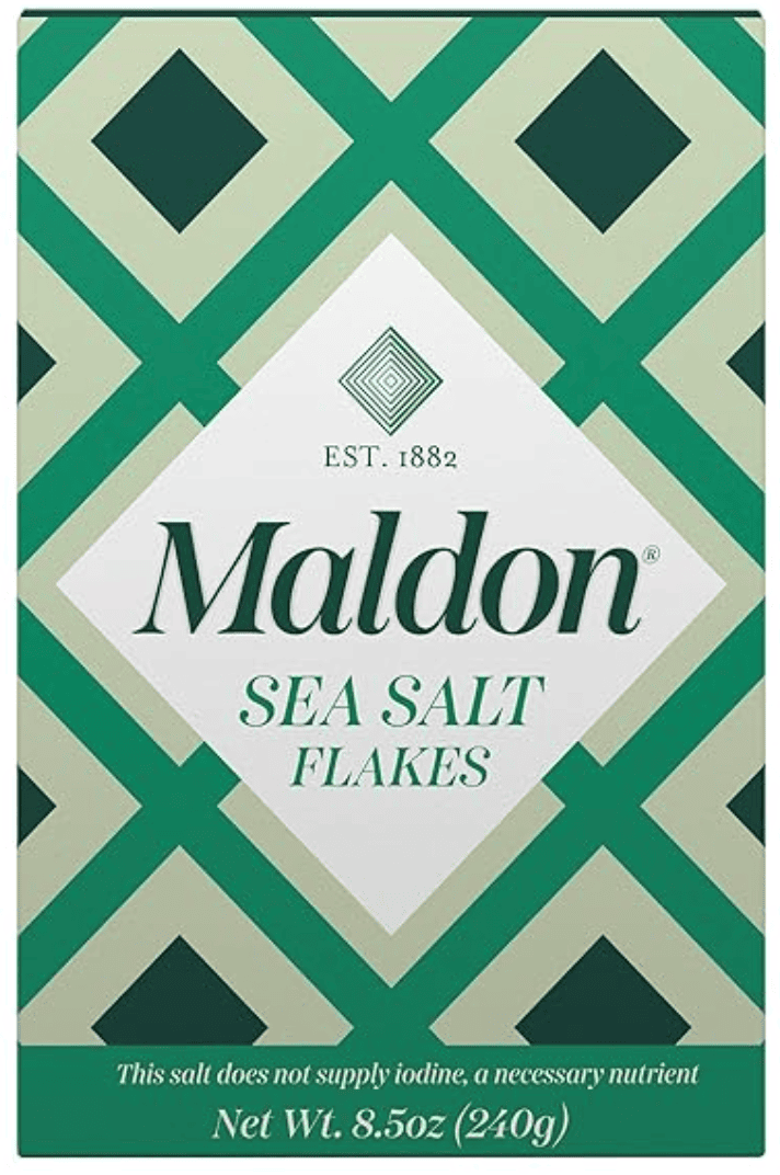a green and white patterned box of Maldon Sea Salt Flakes