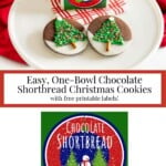 Chocolate shortbread Christmas cookies dipped in white chocolate and decorated with buttercream Christmas trees on a plate, with a festive milk-for-Santa sign and printable cookie label.