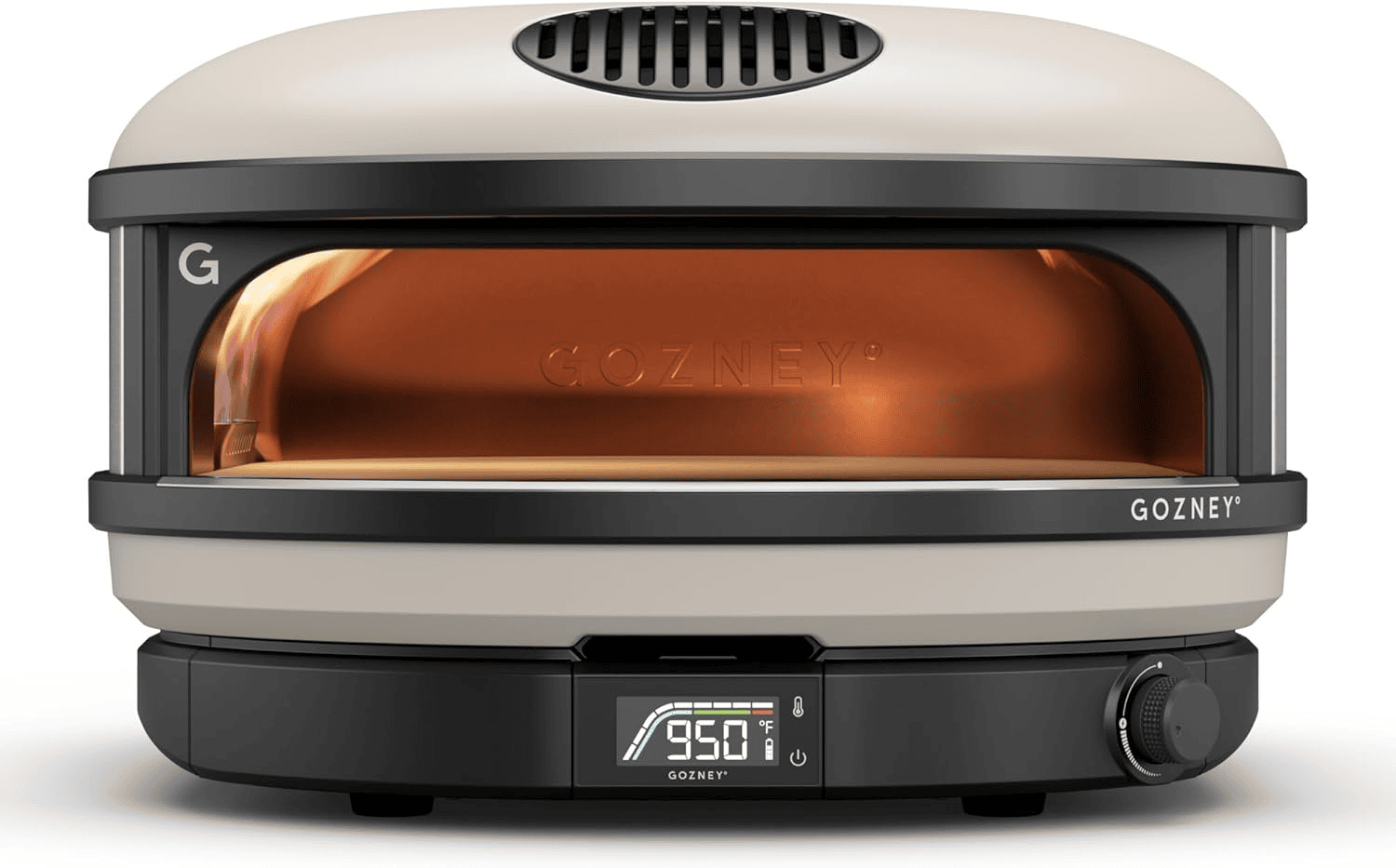 A tan Gozney pizza oven lit inside