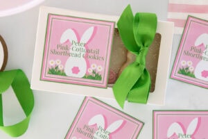 Easter bunny shortbread cookies packaged in a white gift box with green ribbon and pink printable label