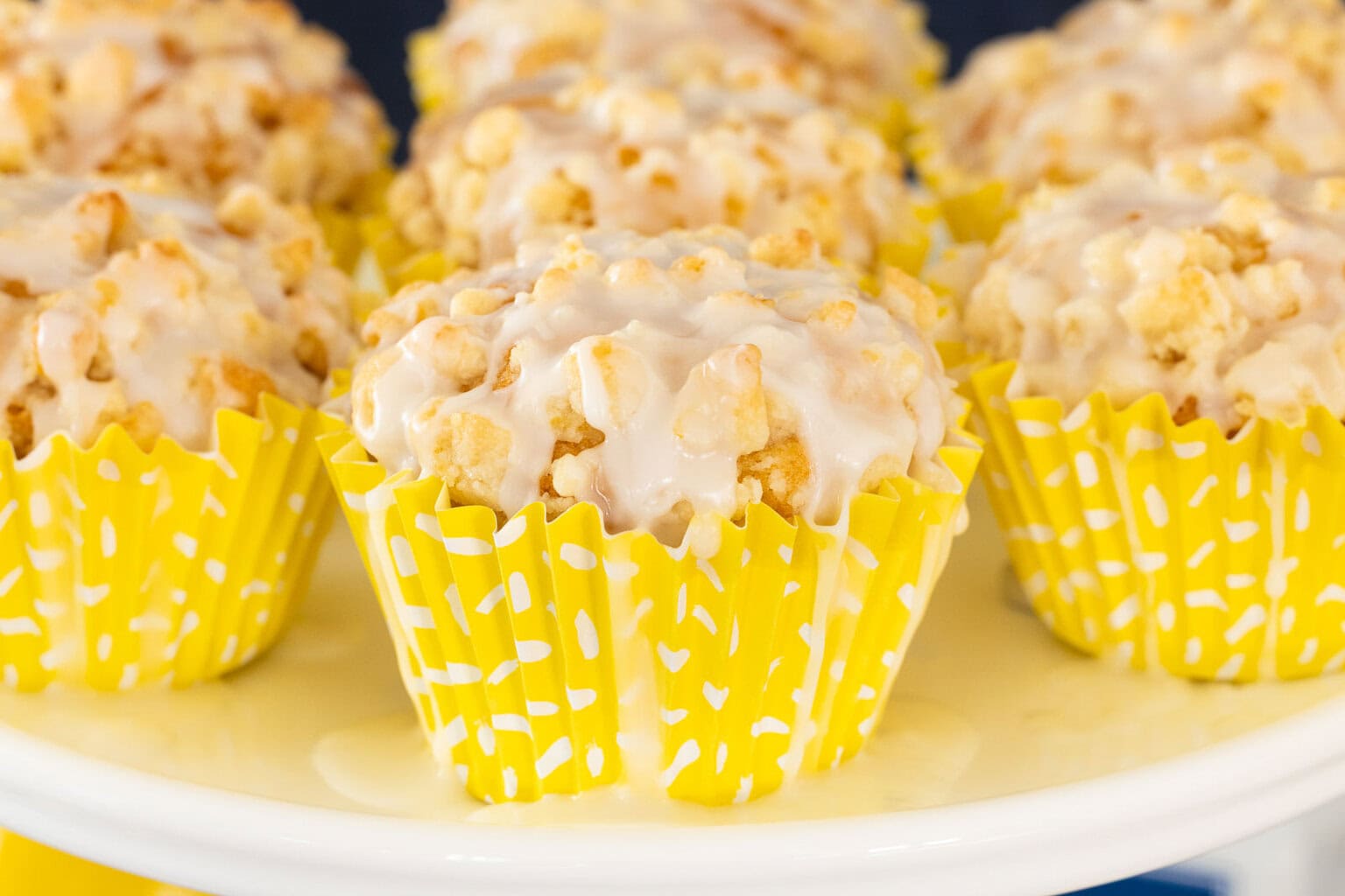 Close-up of lemon crumble muffins showing buttery streusel topping and soft tender texture