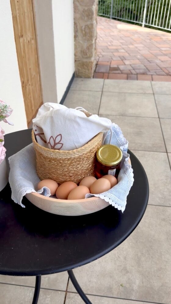 Fresh eggs, homemade jam, and a thoughtful welcome basket left by the host at a Lake Garda Airbnb.