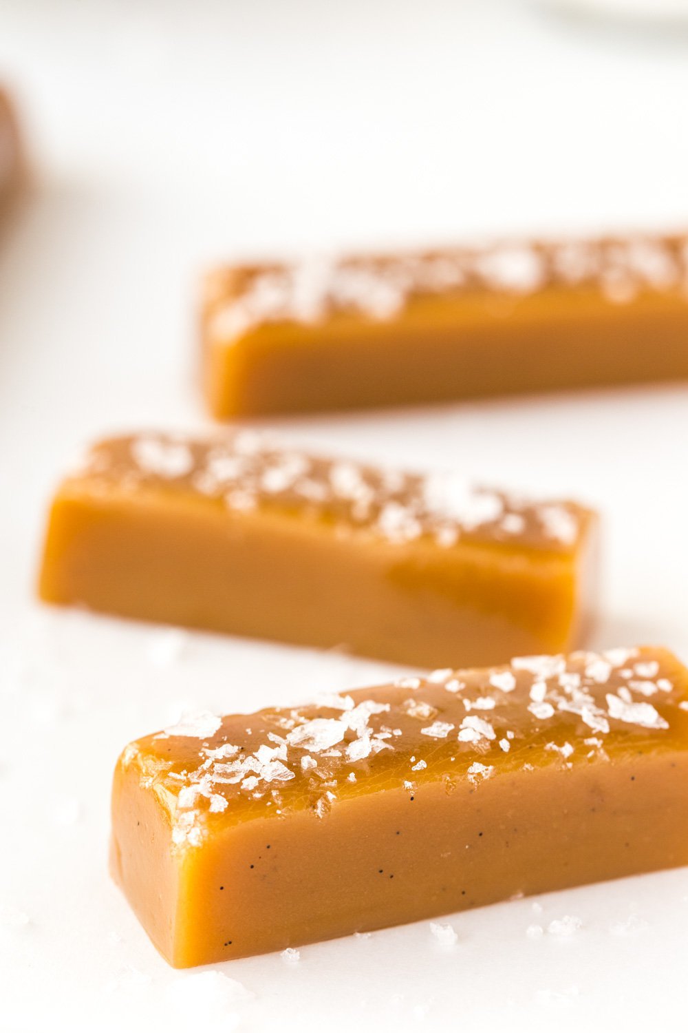 Close up vertical picture of microwave salted caramels with sea salt