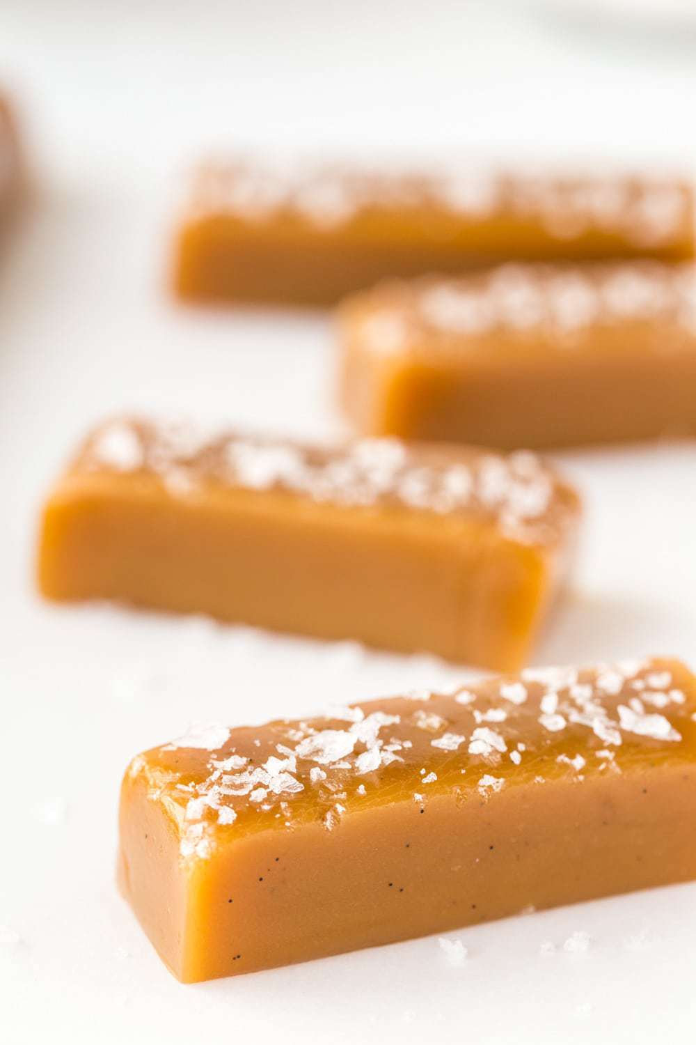 8 Minute Microwave Salted Caramels - Crazy delicious homemade caramels in less than 15 minutes (hands on time)! Everyone who tries them will be begging for more! thecafesucrefarine.com