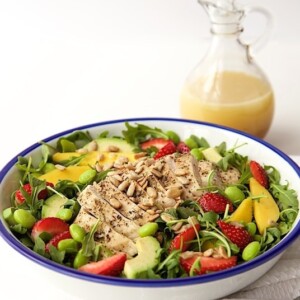 Arugula Chicken Salad with Honey Lime Dressing - a fabulous power salad full of lean protein and delicious fresh produce. The sweet-tart dressing is a perfect finishing touch!