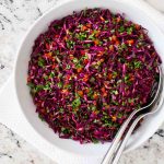 Overhead picture or Asian Red Cabbage Slaw in a white bowl