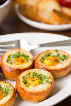 Baked Eggs in Bread Baskets - perfect for an easy, everyday breakfast these eggs are also wonderful for breakfast and brunch get togethers, as most of the prep work can be done ahead of time!