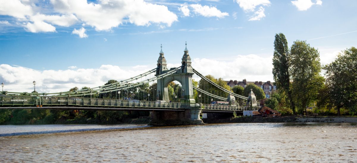 Photo of the Hammersmith Bridge over the Thames River in London, England