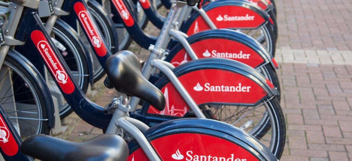 Photo of a public rack of rental bikes on a London, England street.