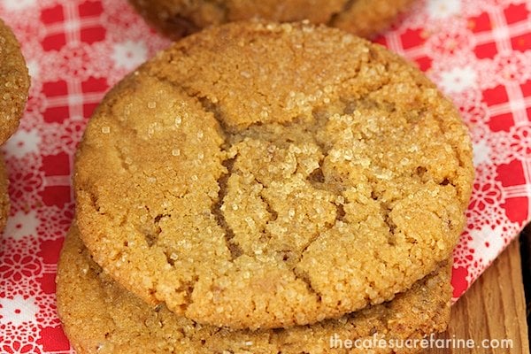 An overhead closeup of Biscoff Toffee Cookies on a red and white napkin.
