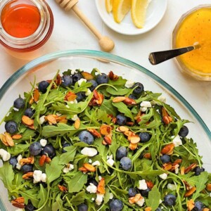 View from above of salad in a glass oval serving bowl.