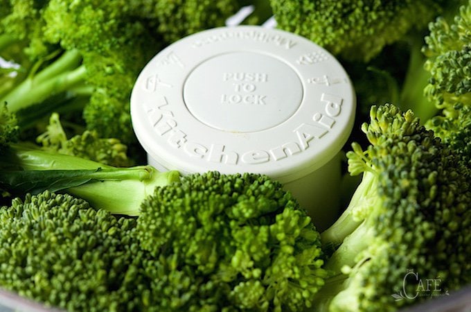 extreme close up of food processor and broccoli