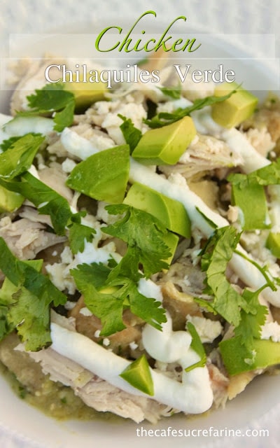 A closeup photo of a white dinner plate of Chicken Chilaquiles Verde.