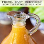 Extreme closeup vertical photo of a glass pitcher of Chili Lime Salad Dressing.