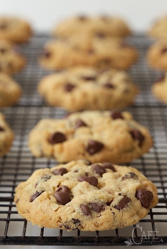 Photo of a cooling rack filled with Chocolate Chip Cherry Oatmeal Cookies.