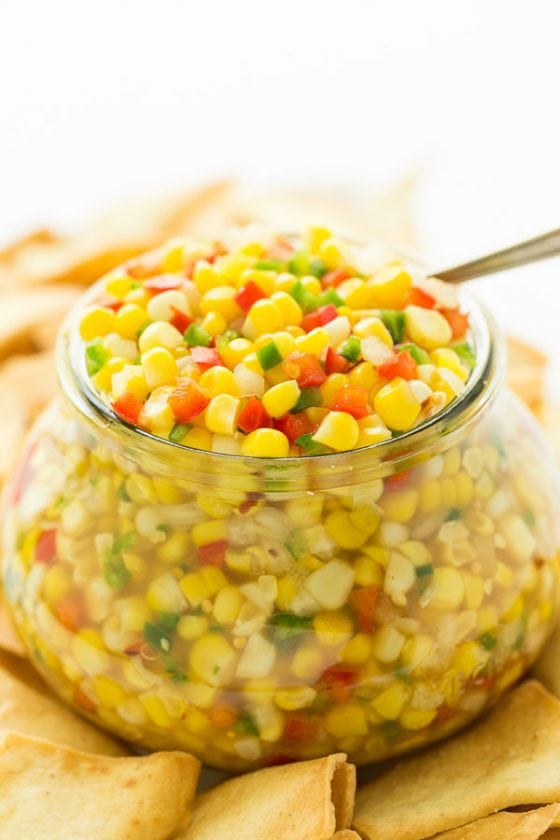 Vertical closeup photo of Copycat Trader Joes Corn and Chile Salsa in a glass Weck jar.