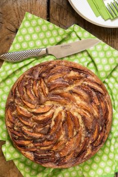 Overhead picture of Danish Apple Cake on a green and white napkin