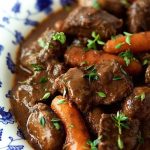 Vertical picture of Beef Daube in a blue and white bowl