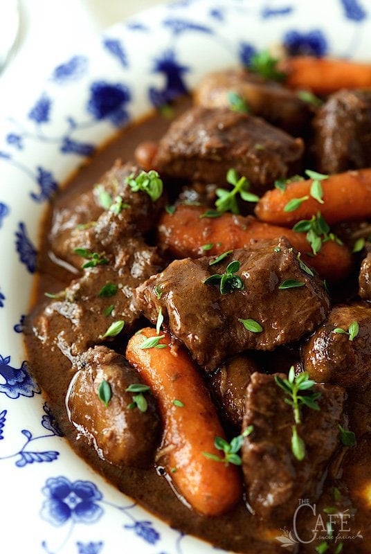 Vertical picture of Beef Daube in a blue and white bowl