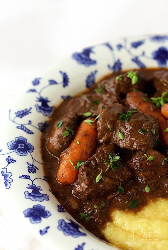 Beef Daube - it's beef stew, Provencal style! Made with red wine, rosemary, thyme and bay leaves, it's slow roasted till all the flavors meld together and the beef is melt in your mouth tender and crazy delicious!