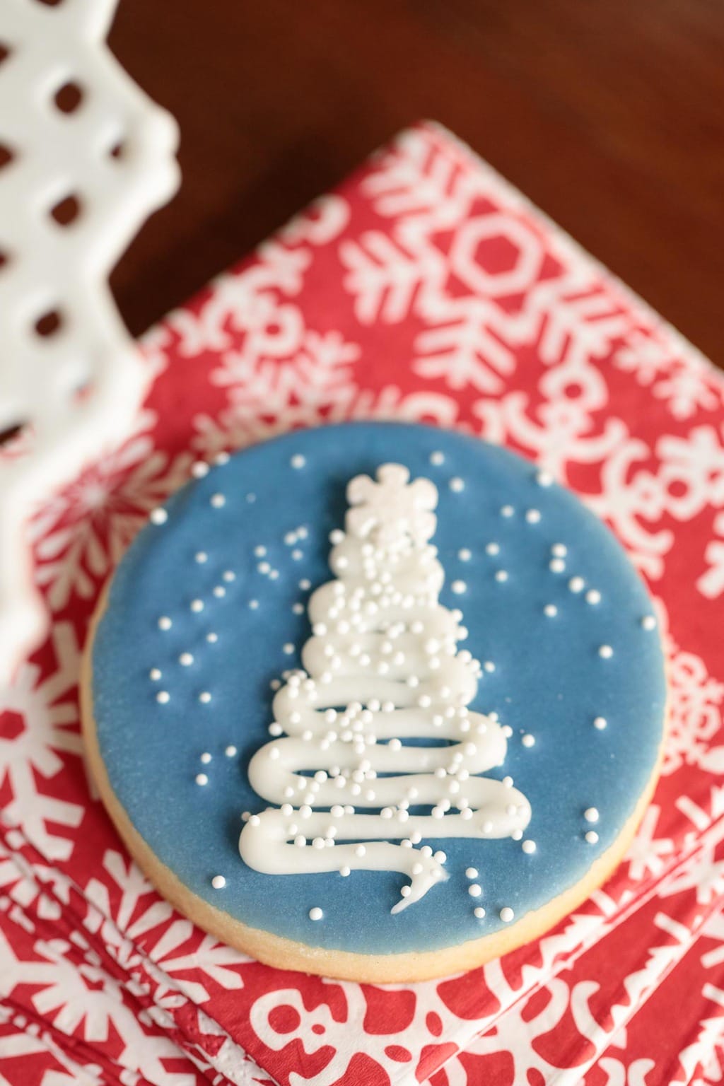 Overhead picture of an Easy Decorated Christmas Cookie on a red and white napkin