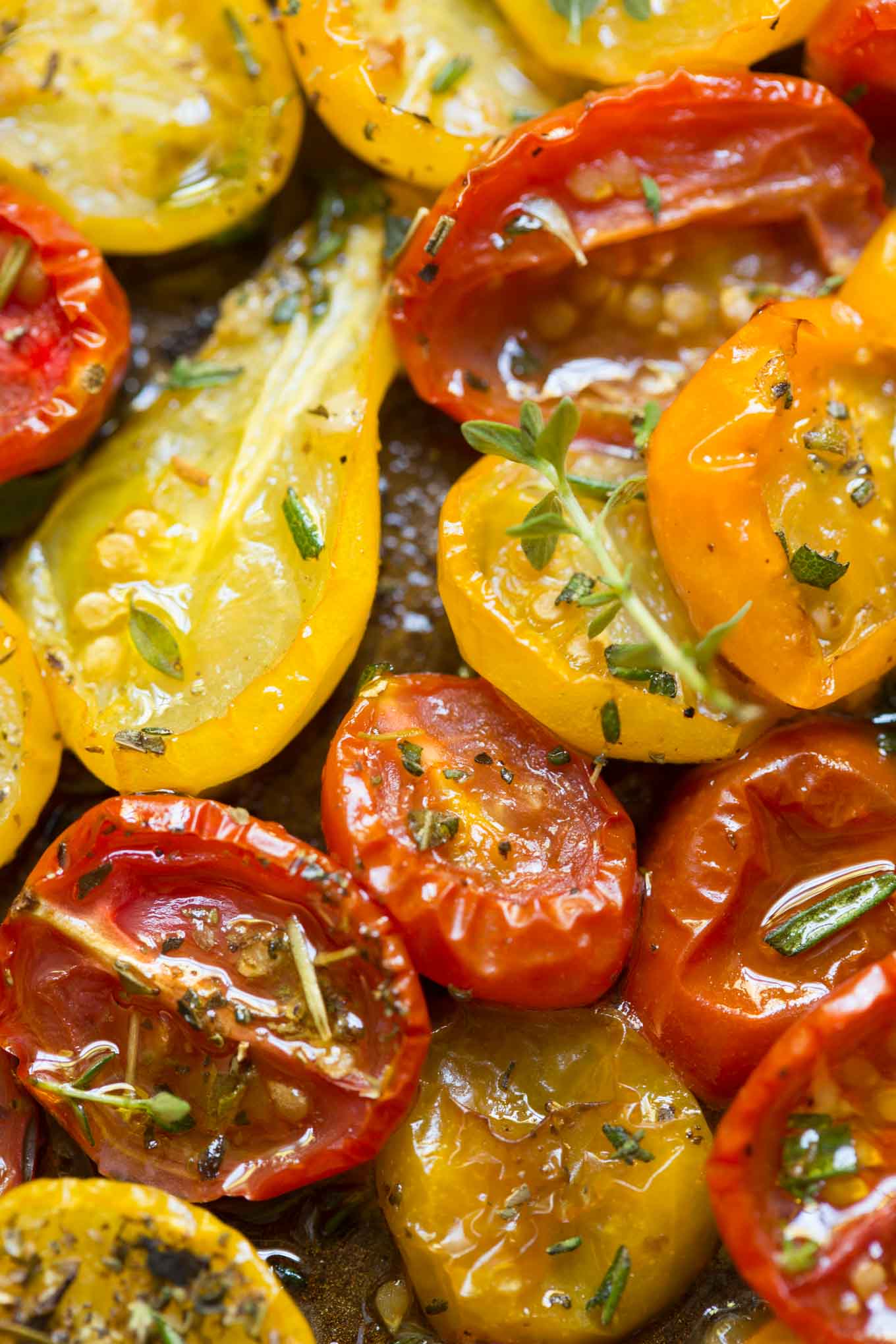 Garlic Herb Roasted Tomatoes - these incredibly flavorful roasted tomatoes are wonderful in salads, pasta dishes, on pizzas, sandwiches and a myriad of other uses! thecafesucrefarine.com