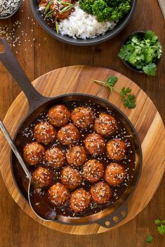 Overhead picture of Huli Huli Chicken meatballs in a cast iron skillet