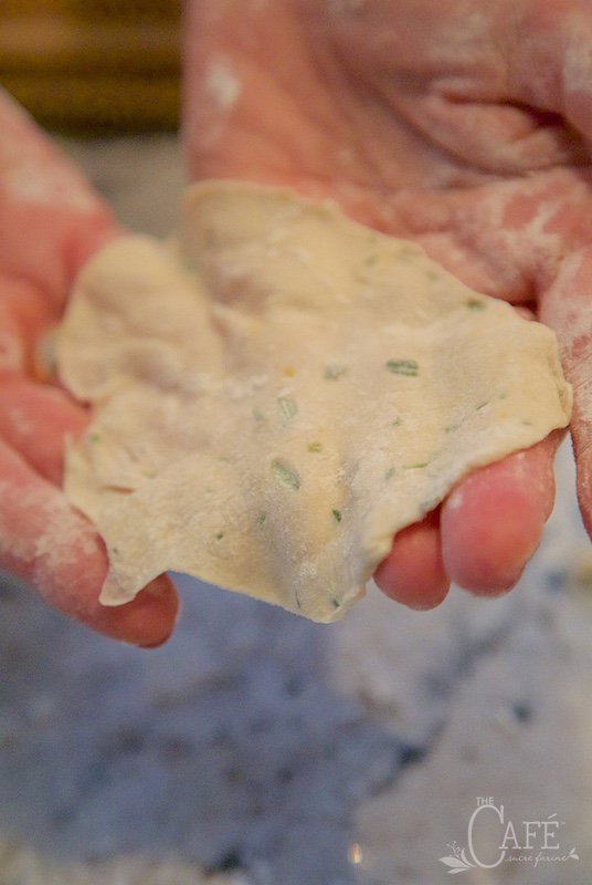 Process photo of the thin rolled dough for Lemon Rosemary Flatbread Crackers.