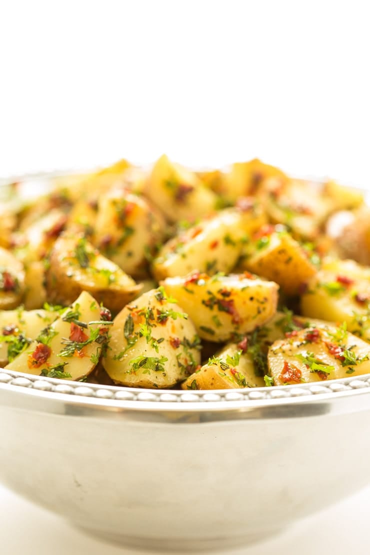 Vertical picture of Lemon Rosemary Potato Salad in a silver bowl