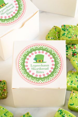 bright green Leprechaun Shortbread Bites in a white box with a custom pink and green label perfect for gifting