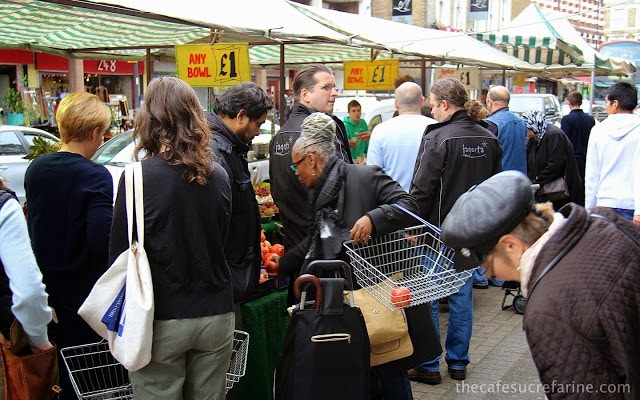 Shoppers at an open air farmer's market in London, England.