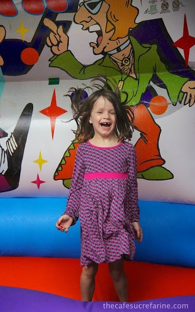 Elle jumping at the school carnival in London, England