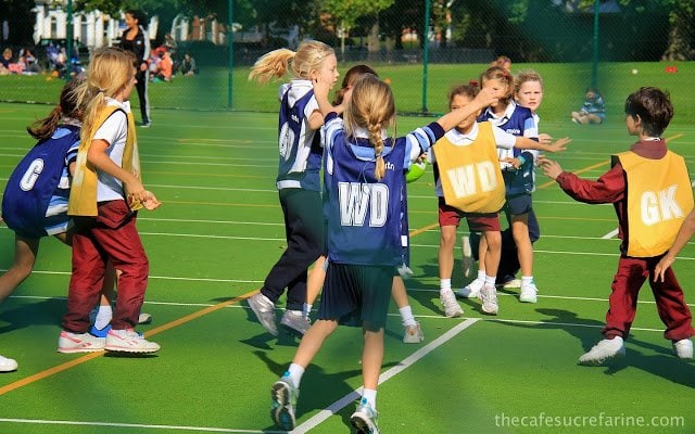 Annie playing netball for the first time in London, England.