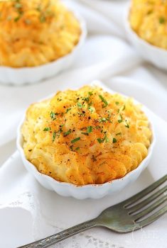 Make Ahead Smoked Gouda Mashed Potatoes - super delicious and super versatile! Don't like or can't find smoked Gouda? Cheddar, parmesan or goat cheese would be a delicious swap!