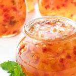 Vertical picture of pepper jelly in a glass jar