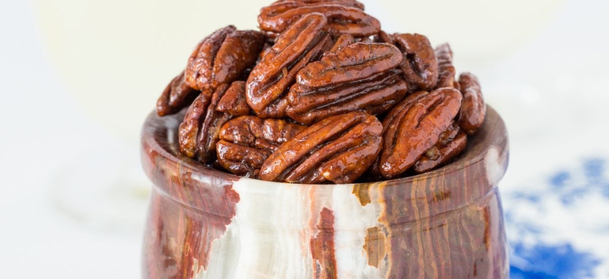 Maple Glazed Pecans in a serving bowl. Holiday appetizers post.