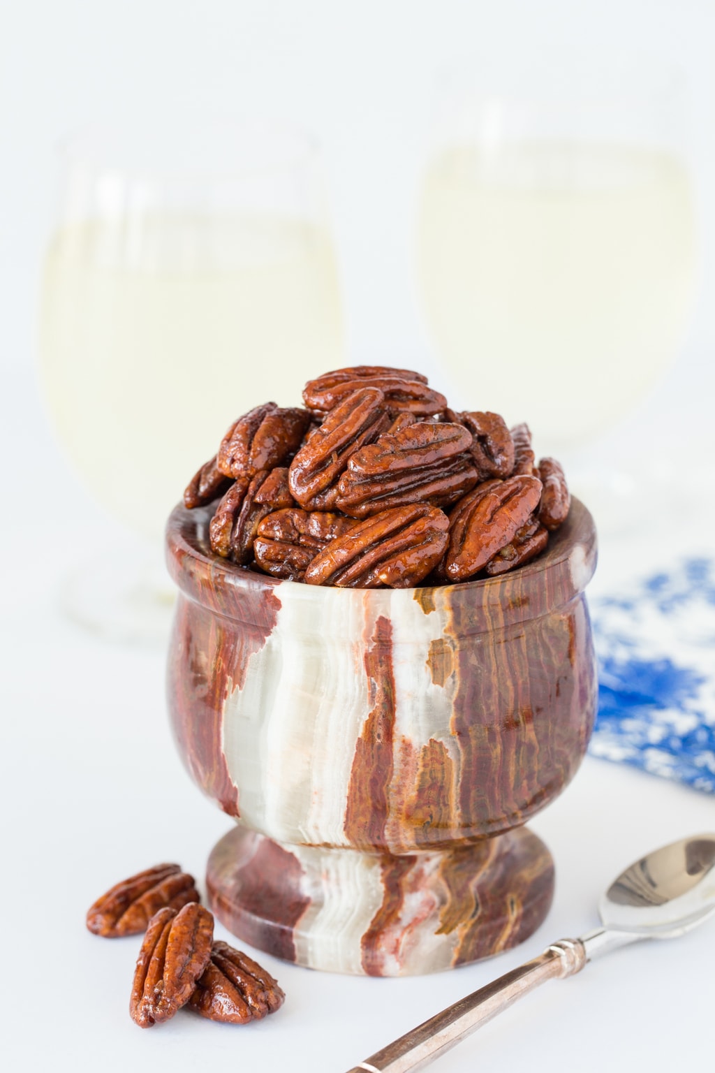 Maple Glazed Pecans in a serving bowl. Holiday appetizers post.