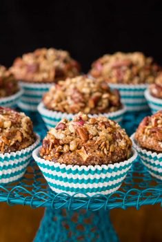 Vertical closeup photo of a turquoise stand with Morning Glory Muffins.