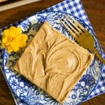 Overhead picture of Peanut Butter Texas Sheet Cake on a blue gingham napkin