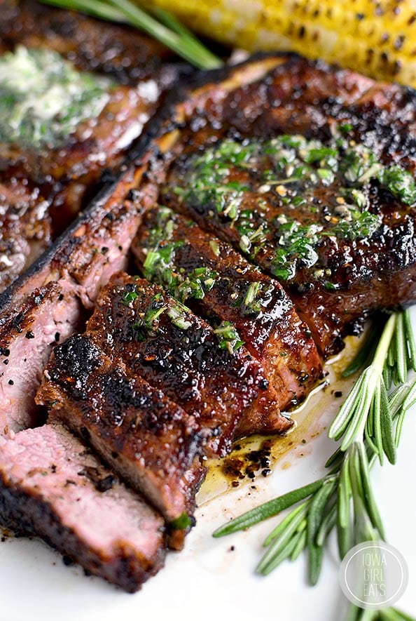 Vertical image of Perfect Grilled Steak with Herb Butter.