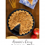 Overhead vertical photo of an Annie's Easy Apple Pie in a blue ceramic pie pan on a wood table.