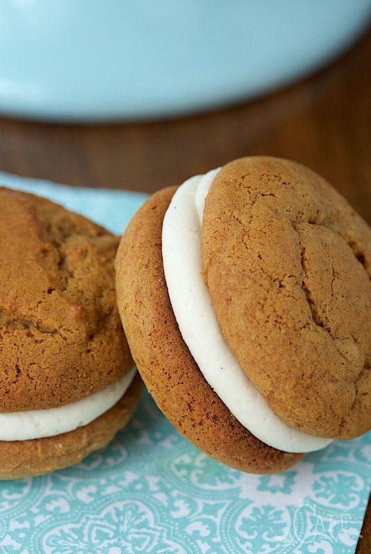 You won't even believe how fabulous these Pumpkin Whoopie Pies are! The cookies are soft, moist and loaded with warm fall spices; but the filling is what sends them over the top. It's the most magically delicious buttercream ever!! www.thecafesucrefarine.com