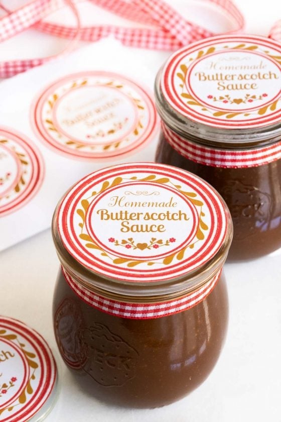 Vertical picture of Butterscotch sauce in jars with labels
