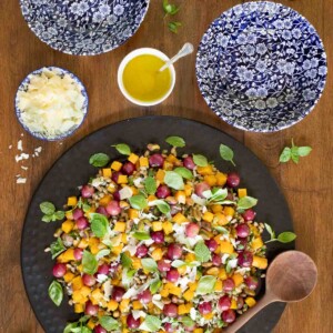 Overhead picture of Roasted Butternut Farro Salad on a wooden table