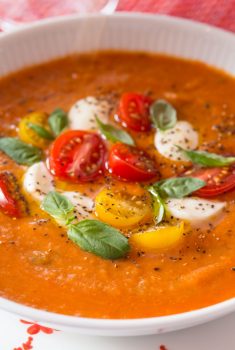 Roasted Tomato Lentil Soup Caprese - with classic tomato-basil flavor and lots of healthy red lentils, this delicious, unique soup has a classic Caprese topping of fresh mozzarella, tomatoes and fresh basil.