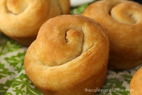 Closeup photo of Buttermilk Honey 5 Minute Dinner Rolls on a green and white napkin.