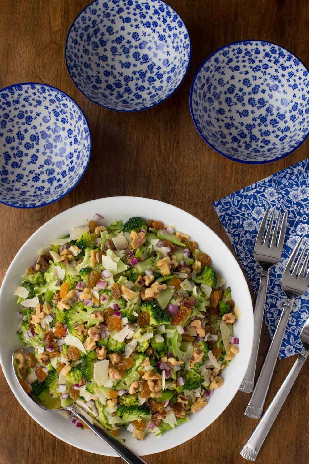 Shaved Broccoli Parmesan Salad with Lemon Mustard Dressing - healthy, unique and season-less, this delicious salad pairs perfectly with sandwiches, wraps and soups. It's also wonderful for parties and potlucks!