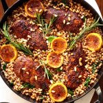 Overhead picture of Skillet Lemon Rosemary Chicken with Farro in a cast iron skillet