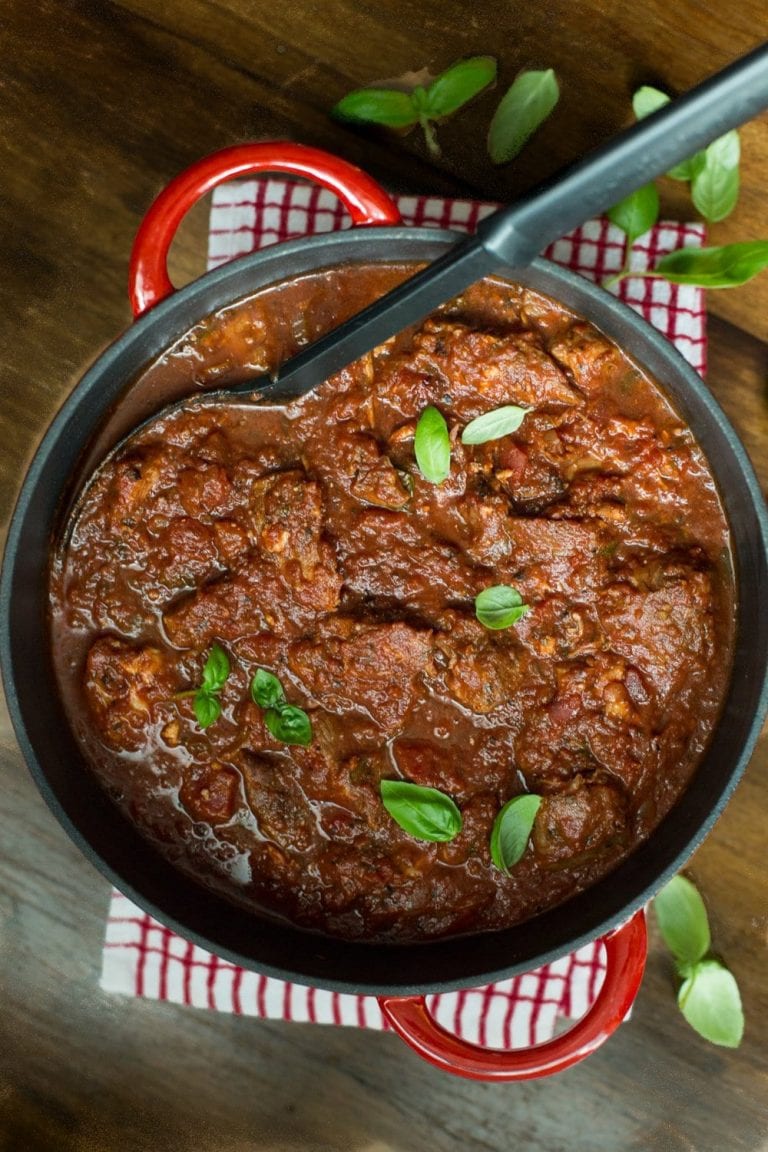 Slow Roasted Italian Pork - make-ahead, super tender and succulent pork in a thick, rich Italian tomato sauce.