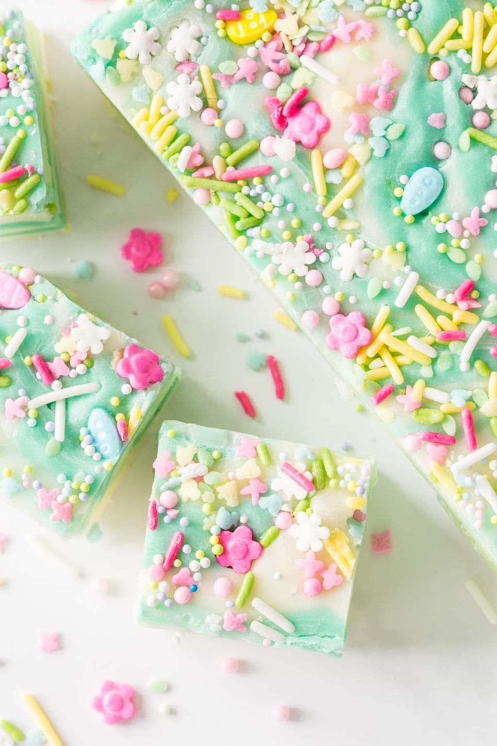 Vertical overhead picture of spring fantasy fudge cut into squares